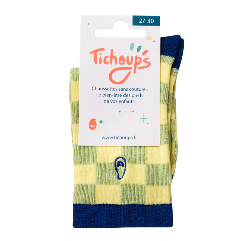 vue de face des chaussettes sans couture damier vert et bleu avec son packaging en carton.