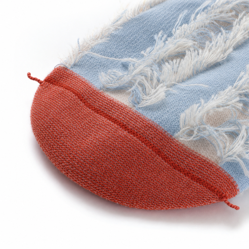 Chaussette sans couture sur l'envers avec détail de la couture plate.