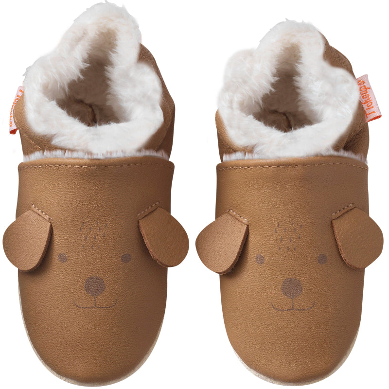 chaussons marron en cuir souple fourré pour enfant marron avec une tête de chien vue de face