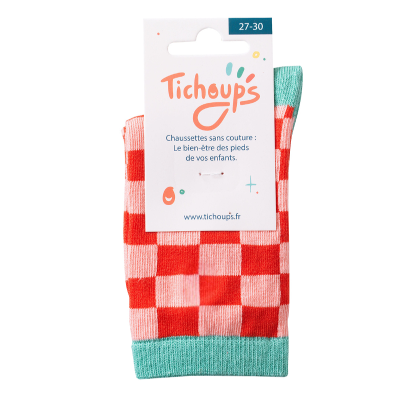 chaussettes sans couture enfant à motifs damier rouges et vert et son packaging cartonné vue de face