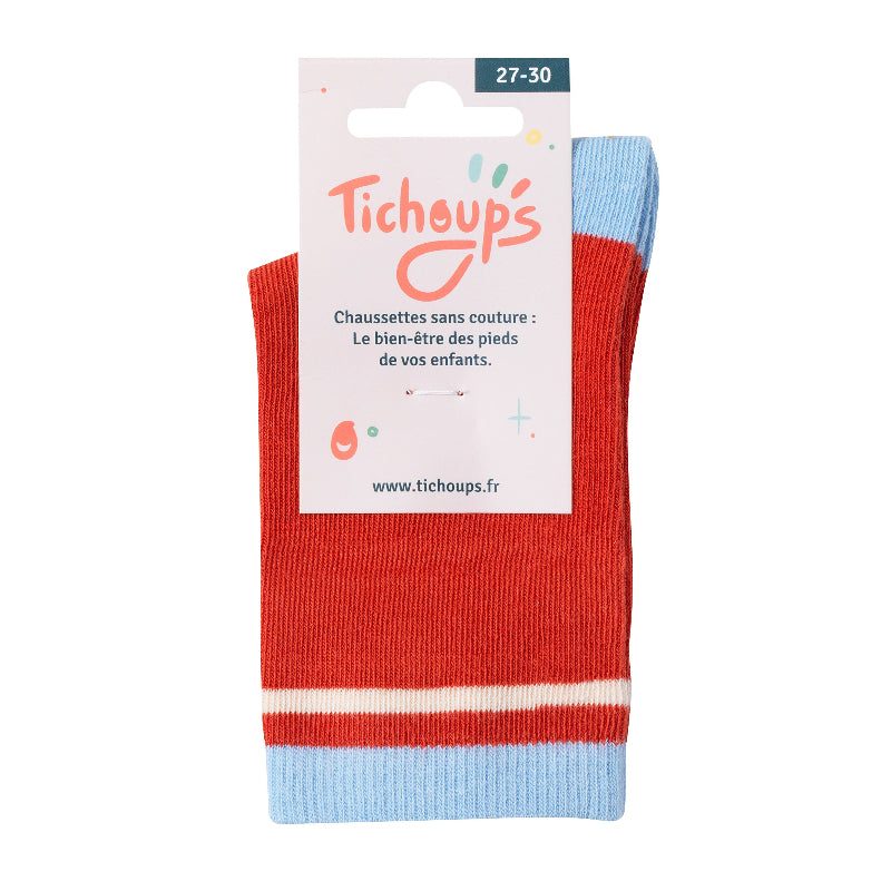 Chaussettes sans couture unies rouge avec détails bleu ciel vue de détail du packaging cartonné recto.