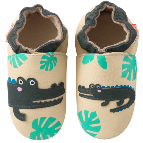Chaussons pour enfant en cuir souple avec des motifs cousus crocodiles et vue de face.