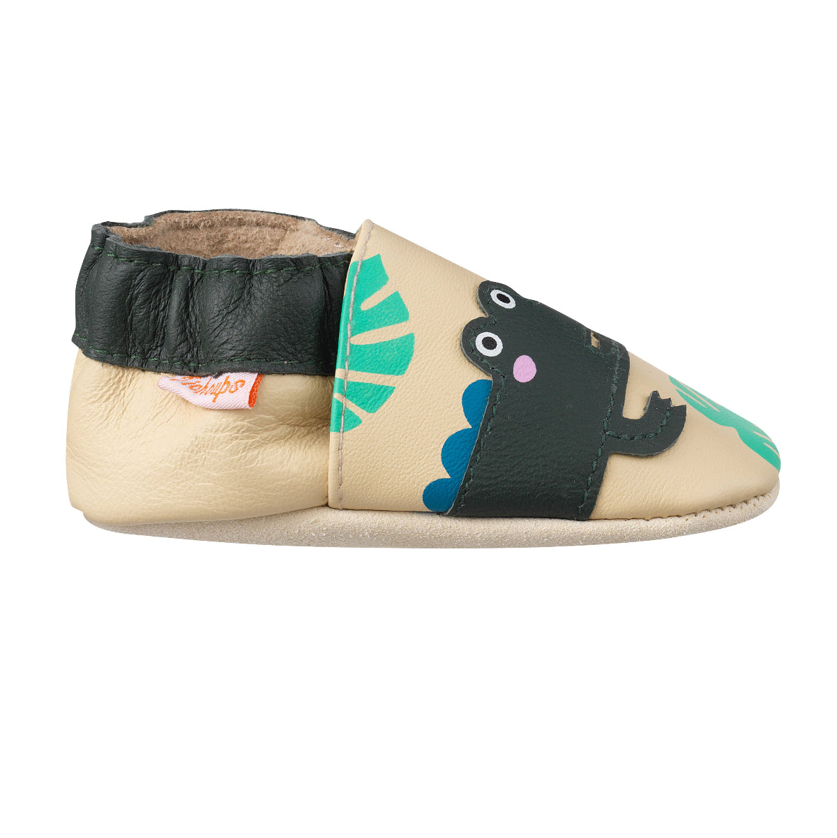 Chaussons enfant cuir souple à motifs crocodile vue de profil.