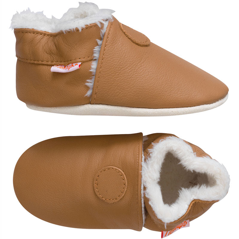Chaussons fourrés en cuir souple coloris marron pour enfant vue de profil