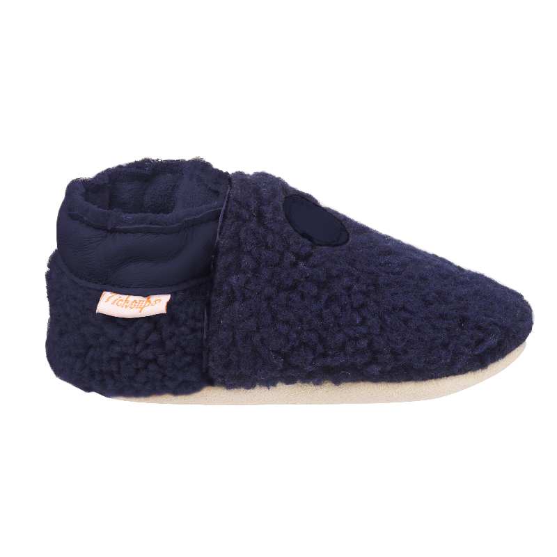 Vue de profile des chaussons souple enfant Bouclettes marine .